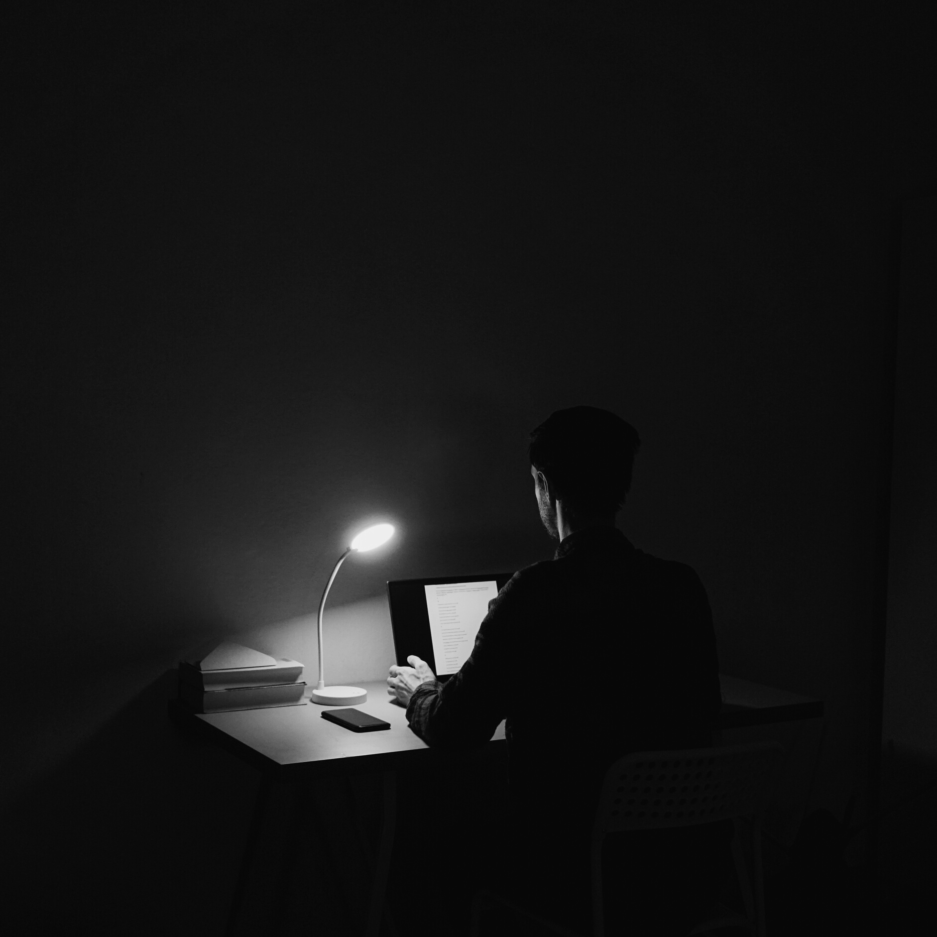 Man working on laptop at home
